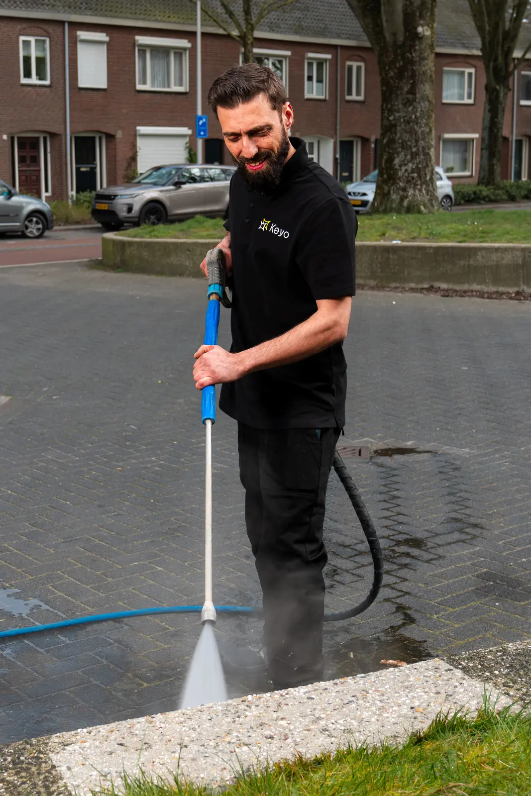 Hogedrukreiniging van bestrating met heet water door Keyo